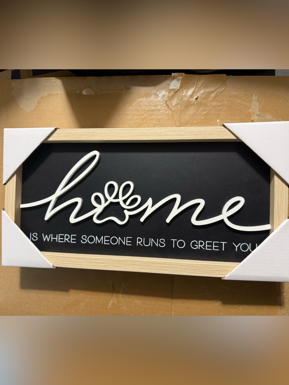 Home is where someone runs to greet you sign